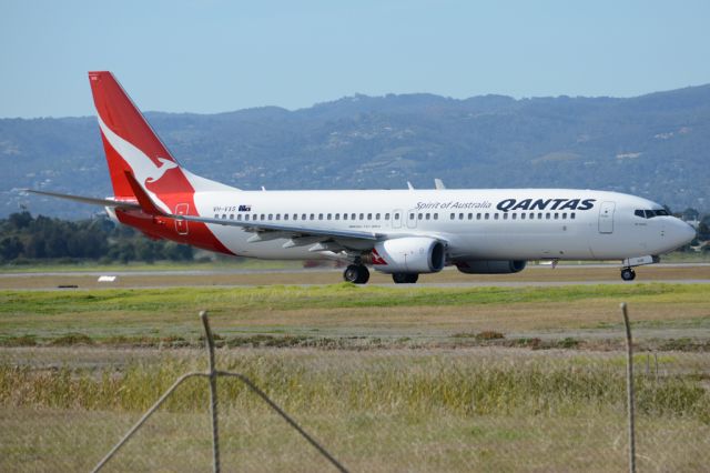 Boeing 737-800 (VH-VXS) - On taxiway heading for take-off on runway 05. Thursday, 8th May 2014.