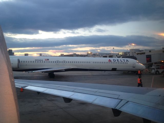 McDonnell Douglas MD-90 (N906DA) - N906DA at Philly Airport on March 22, 2013. This photo was taken from another plane.