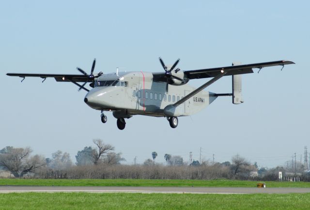 — — - C23 on short final at KMCE, Merced Regional Airport.