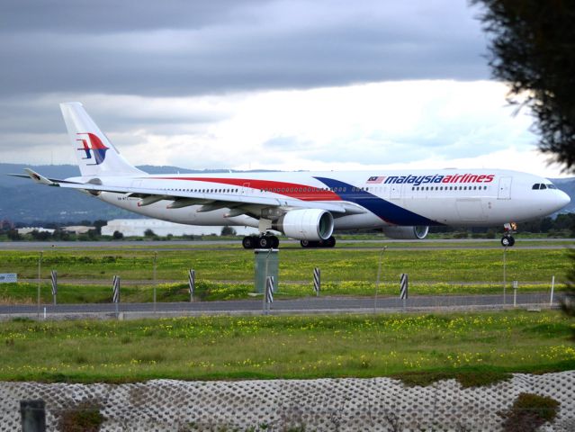 Airbus A330-300 (9M-MTC) - On taxi-way heading for take off on runway 05, for flight home to Kuala Lumpur, just before the arrival of a rain storm. Thursday 12th July 2012.