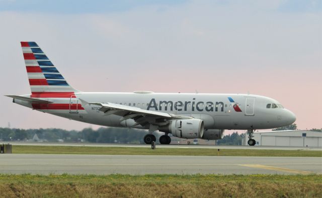 Airbus A319 (N732US) - *****SELECT FULL FOR HD*****br /br /br /br /br /br /br /BEAUTIFUL sunset view of an A319 at Buffalo closing the reversers!!