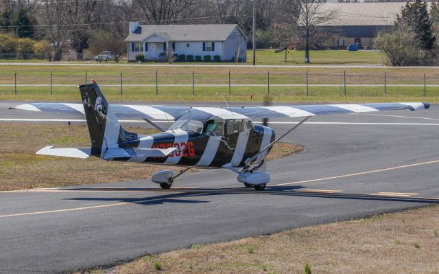 Cessna Skyhawk (N7992G) - March 19, 2017, Lebanon, Tenn -- This unique Cessna 172L is holding short of runway 19.  I wished he had come back around, but these were the only shots I could catch.