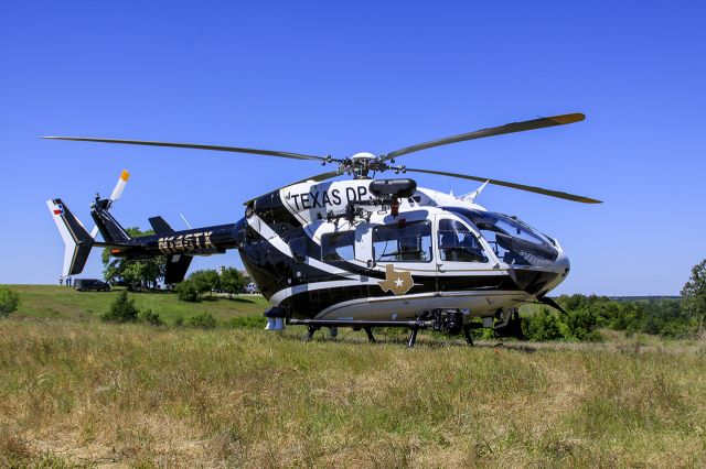 N145TX — - Texas DPS EC145 parked in the grass during a SAR exercise