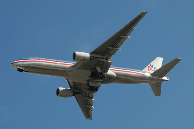 Boeing 777-200 (N794AN) - Aircraft powering up, sucking gear up after going missed approach and going around on very short final. Very cool to hear and see!