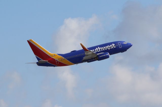 Boeing 737-700 (N7878A) - Southwest Airlines (WN) N7878A B737-7K9 [cn34320]br /Fort Lauderdale (FLL). Southwest Airlines flight WN5617 departs for Baltimore/Washington Thurgood Marshall International (BWI).br /Taken from Terminal 1 car park roof level br /2018 04 07br /a rel=nofollow href=http://alphayankee.smugmug.com/Airlines-and-Airliners-Portfolio/Airlines/AmericasAirlines/Southwest-Airlines-WNhttps://alphayankee.smugmug.com/Airlines-and-Airliners-Portfolio/Airlines/AmericasAirlines/Southwest-Airlines-WN/a