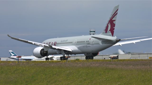 Boeing 787-8 (A7-BCB) - BOE461 (LN:58) on its takeoff roll on runway 34L on 6/25/12. Let the first flight begin!