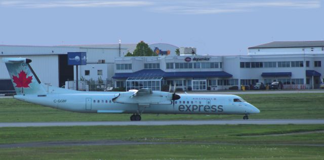 de Havilland Dash 8-400 (C-GGBF) - Taxiing to parking is this 2012 Air Canada Express de Havilland Canada Dash 8-400 in the Spring of 2024.