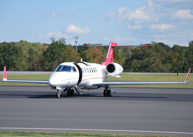 Learjet 40 (N401LJ) - DAVIS AIR LLC at KJQF - 10/23/13