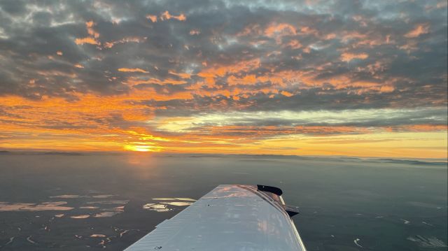 Beechcraft Bonanza (36) Turbo — - California Central Valley at Sunset