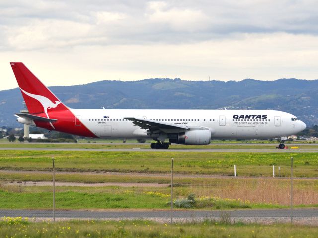 BOEING 767-300 (VH-ZXC) - On taxi-way heading for take off on runway 05, for flight to Sydney. Thursday 12th July 2012.