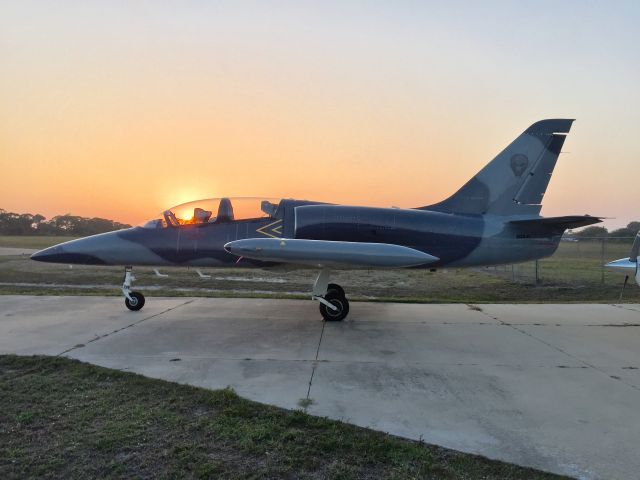 Aero L-39 Albatros (N39JV) - February 13, 2017 Venice Airport, Florida.  Sun setting over Gulf of Mexico backlights this Aero L-39C. 