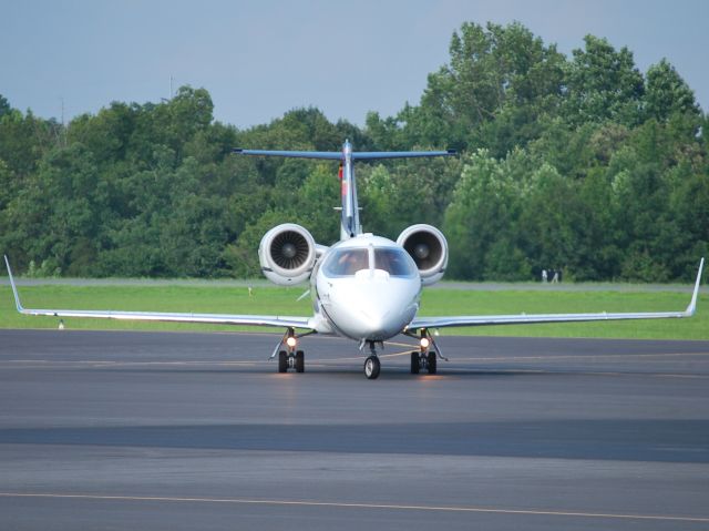 Learjet 60 (N42JP) - WELLS FARGO BANK NORTHWEST NA TRUSTEE (NASCAR driver Juan Pablo Montoya) returning from the Brickyard 400 at KJQF - 7/28/13