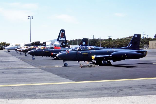 N17081 — - AUSTRALIA - AIR FORCE - COMMONWEALTH CA-30 (MB326H) - REG : A7-081 (CN CA30/81) - EDINBURGH ADELAIDE SA. AUSTRALIA - YPED (7/11/1992)NICE LINE UP AT EDINBURGH RAAF BASE. 35MM SLIDE CONVERSION. 