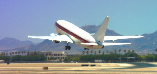 Boeing 737-700 — - Departure from 7L .. With  no clear identifying markings, thought to be "secret flight" to Area 51     06-02-2013    Image shot, as passenger on departing SWA # 1994, taxiing for take off