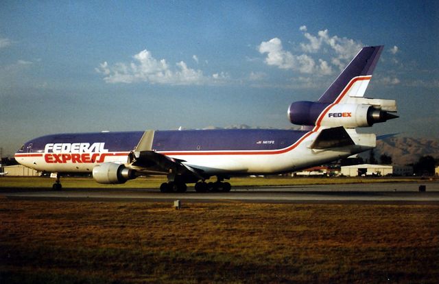 Boeing MD-11 (N611FE) - KSJC - Federal Express MD-11 48604/553 - cleared for take off on 30 L at San Jose to Memphis. This jet written off after a hard landing and roll over at Newark New Jersey on 31/07/1997.