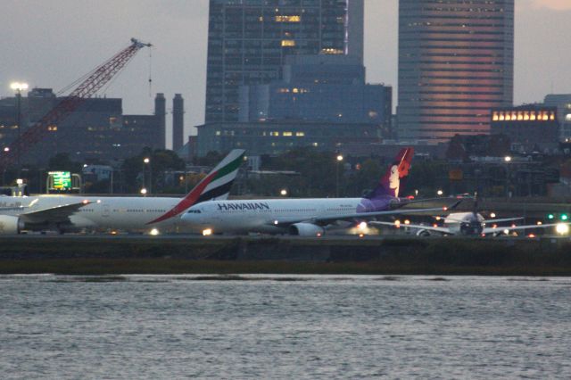 Airbus A330-200 (N370HA) - The Las Vegas Raiders taxi for departure at dusk after playing the Patriots. 