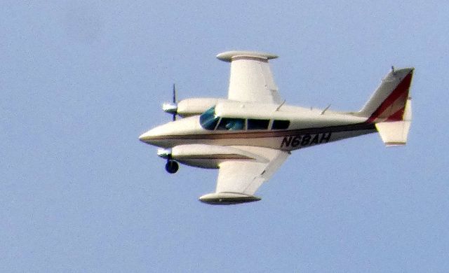 Piper PA-30 Twin Comanche (N68AH) - In the distance on a left downwind is this 1968 Piper PA-30 Twin Comanche in the Summer of 2019.