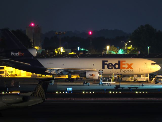 Boeing MD-11 (N68051) - Taken from airport overlook July 12, 2014.