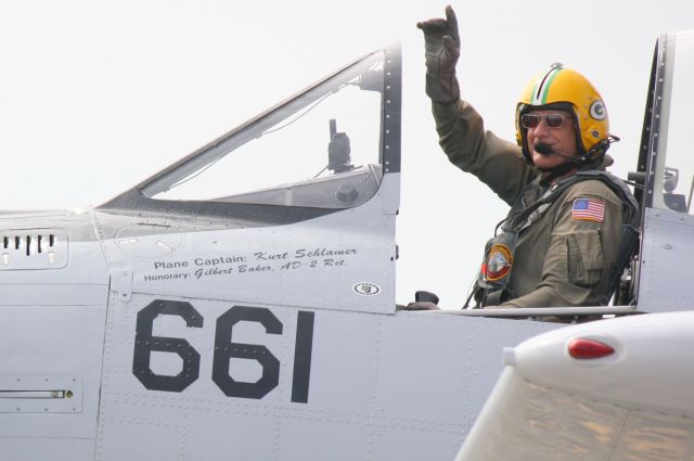 North American Trojan (N661NA) - T28 Trojan pilot Herb Baker greets the crowd following his performance at MacDill AirFest