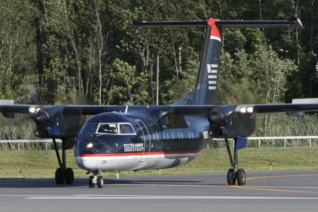 de Havilland Dash 8-100 (N812EX) - August 6, 2010 - leaving Albany