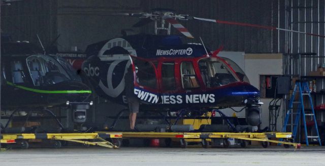 Bell 407 (N77NY) - LINDEN AIRPORT-LINDEN, NEW JERSEY, USA-AUGUST 25, 2022: A news helicopter from one of the local New York City television stations was seen by RF in the hangar.