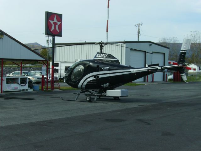 N2028J — - Schweizer 333 at Grant County Airport (W99) during powerline patrol.