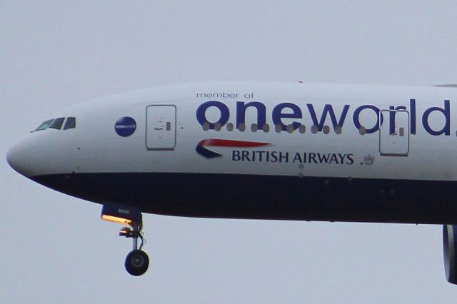 Boeing 777-200 (G-YMMR) - The First Birtish Airways One World Livery (this one being a British Airways B777-200 reg'd as G-YMMR) since the B747s, which were retired early due to COVID. This one is on final approach into LHR, Landing on runway 27R.br /br /Location: Eastern Perimiter Road.br /Date: 01.01.23 (dd/mm/yy).