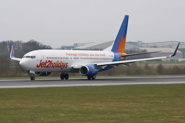 Boeing 737-800 (G-JZBS) - Now wearing the full Jet2 scheme after being delivered in plan white and blue.  EXS835 on the way to Grenoble.