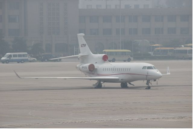 Gulfstream Aerospace Gulfstream G650 (VP-CPG) - Gov jets parked for years on the side of T2. You can see them when driving up (on the right) for domestic departures...