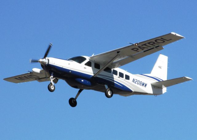 Cessna Caravan (N208MW) - Taking off RWY 26L