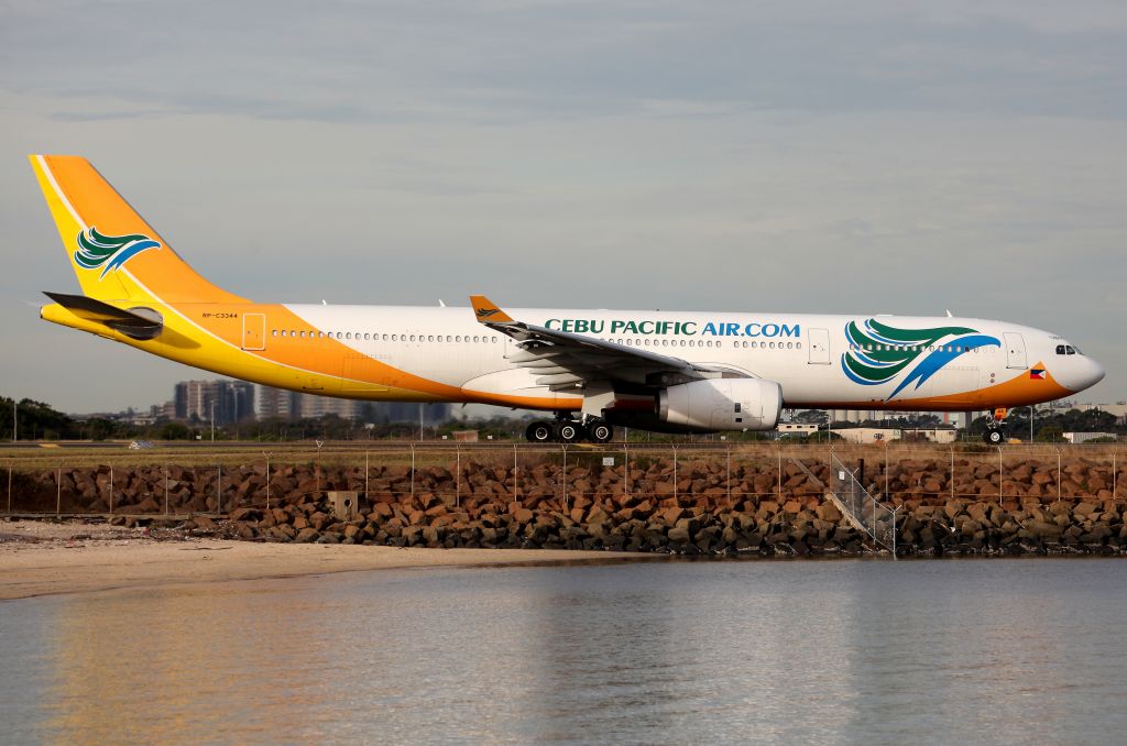Airbus A330-300 (RP-C3344) - The Original Livery reflects nicely,heading for Rwy 34L