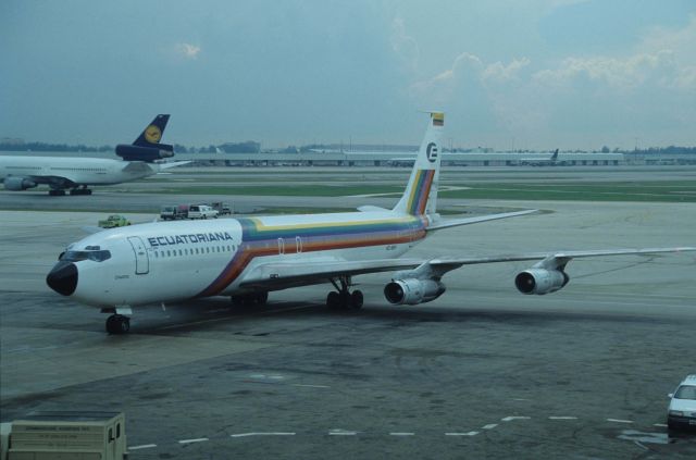 Boeing 707-300 (HC-BHY) - Taxing at Miami Intl Airport on 1990/08/30