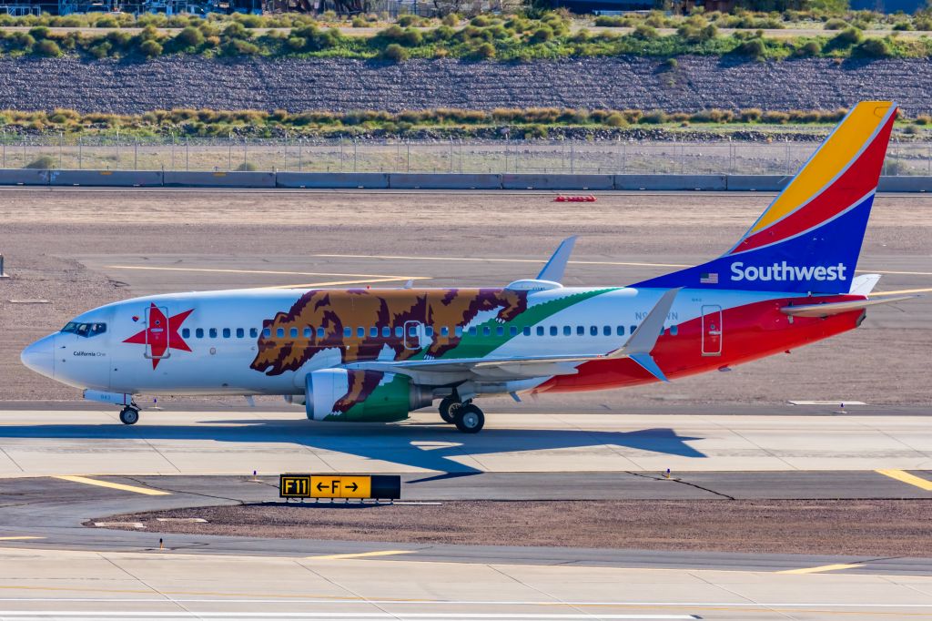 Boeing 737-700 (N943WN) - A Southwest 737-700 in California One special livery taxiing at PHX on 2/12/23 during the Super Bowl rush. Taken with a Canon R7 and Canon EF 100-400 II L lens.