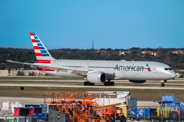 Boeing 787-9 Dreamliner (N825AA) - Exiting 13R after arriving from aerial tests.