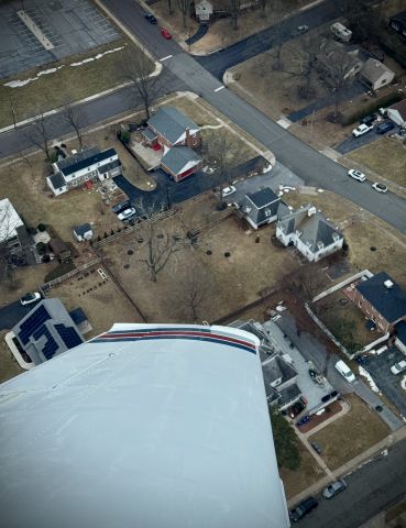 Mooney M-20 (N56928) - I always do a loop around my house before I land from a long flight.