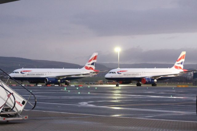 Airbus A320 — - Two British Airways A320s stored at Glasgow Airport.br /br /Location: The apron of Glasgow Airport.br /Date: 25.10.22 (dd/mm/yy).