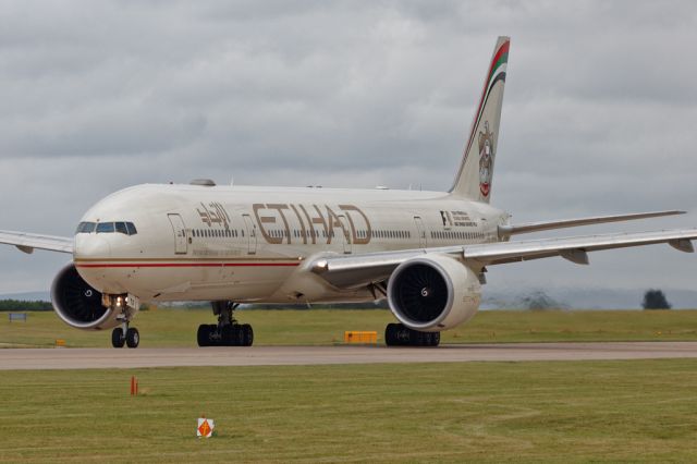 BOEING 777-300ER (A6-ETG) - ETD16 starting the take off roll on the flight back to Abu Dhabi.