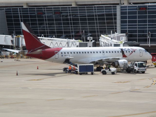 Embraer ERJ-190 (N937TA) - Taca flight 440 arrived from San Salvador, El Salvador