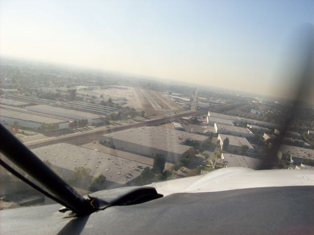 Mooney M-20 (N201QR) - Landing on runway 24 at home - Fullerton Municipal Airport