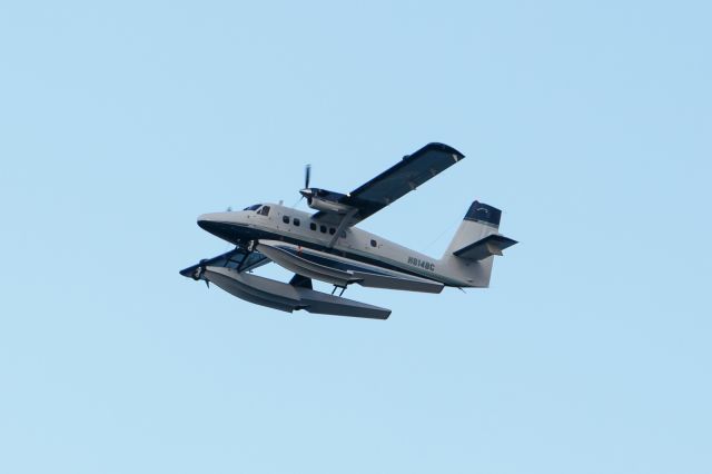 Fairchild Dornier SA-227DC Metro (N814BC) - Flying over a beach in Boca Raton.