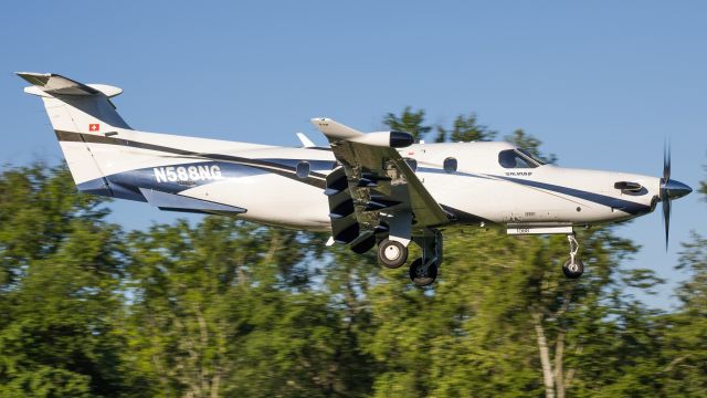 Pilatus PC-12 (N588NG) - N588NG on a short final to College Park Airport's runway 33 after a flight from Harriman-and-West 