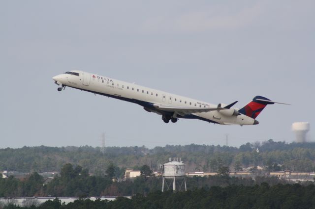 Canadair Regional Jet CRJ-900 (N186GJ) - N186GJ taking off runway 23R