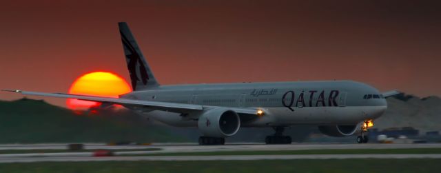 BOEING 777-300ER (A7-BAQ) - Beautiful sunset at the end of runway 10L as QR722 was leaving for Doha.