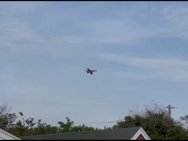 Boeing Hornet (15376228) - Not the best of pictures. I was just sitting on my back porch when this F-18 super hornet fighter jet ziped by. it didn’t look like it was landing so I looped around and I got a picture that time. 