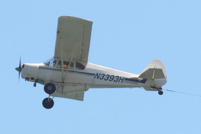Piper PA-12 Super Cruiser (N3393H) - High Exposure Piper PA-12 towing a banner ad past Rehoboth Beach on June 22, 2024.