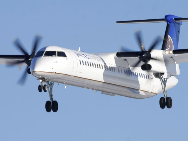 de Havilland Dash 8-400 (N34NG) - Colgan Air latest Q400 delivered Dec 16, 2010 is on short final for Rwy 25