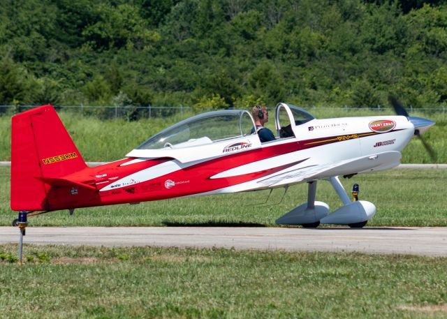 Vans RV-8 (N553KM) - Austin Rieder, the son of Redline lead Ken Rieder, takes one of the former show RV-8s for a flight.