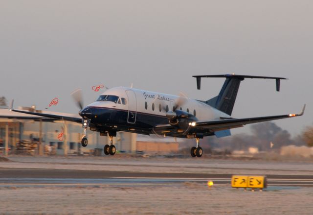 Beechcraft 1900 (N169GL) - The moment of impact with a small bird. (A Killdear)