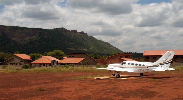 Cessna Chancellor (ZS-LTY) - At the iron ore mine Thabazimbi, South Africa. All is red.