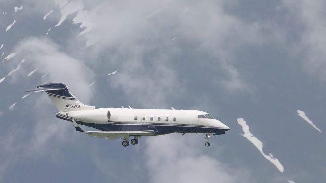 Bombardier Challenger 300 (N985KM) - On approach to Juneau on a cloudy day